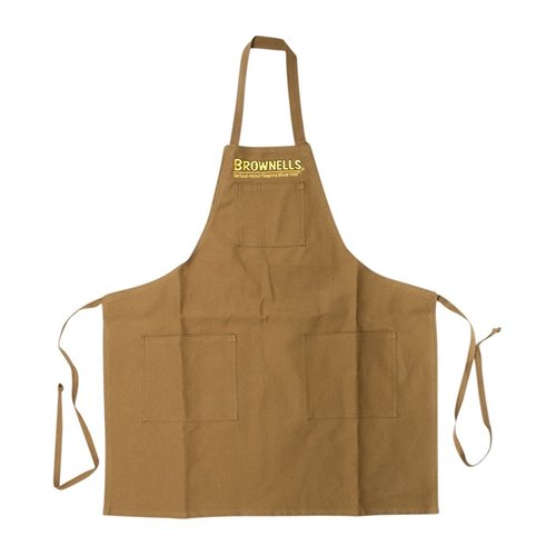 SHORT PREMIUM SHOP APRON är skräddarsydd för professionella vapensmeder, tillverkad av slitstarkt bomullsmaterial med justerbar nackrem och rymliga fickor.