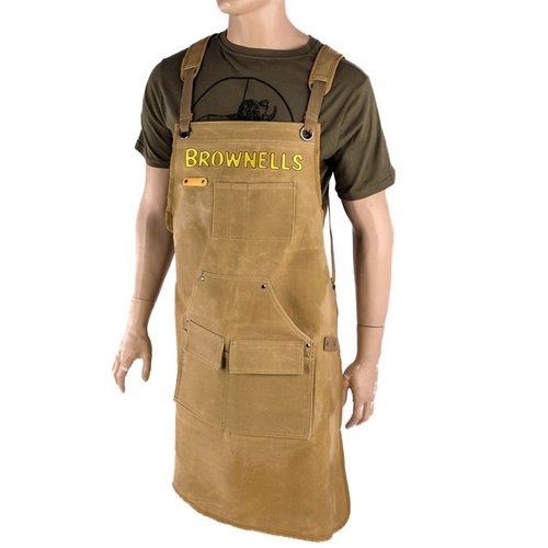 Brownells Premium Shop Apron i vaxad kanvas erbjuder hållbarhet, 5 fickor, en bröstficka med avdelare, hammarslinga och justerbara, vadderade axelremmar för komfort.