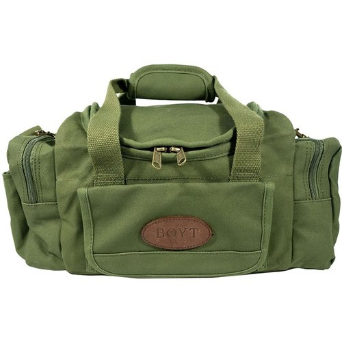 SIGNATURE SERIES CANVAS SPORTING CLAYS BAG är tillverkad av vaxad canvas, har en klamshell-öppning och rymmer 8 shotgun shell-boxar med praktiska fickor.